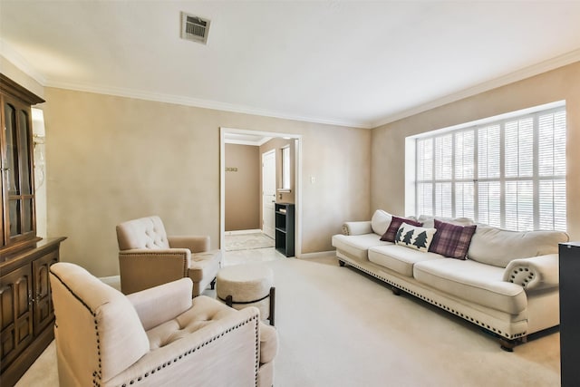 carpeted living room featuring ornamental molding