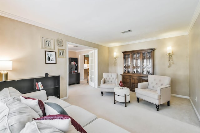 carpeted living room with crown molding