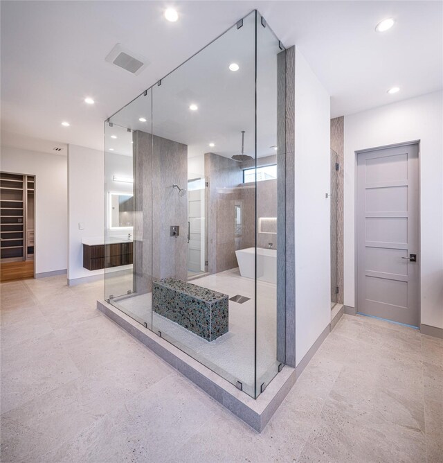 bathroom with independent shower and bath