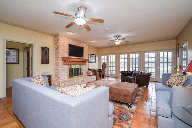 tiled living room with ornamental molding, plenty of natural light, a textured ceiling, and french doors