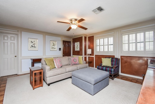 living room with ceiling fan