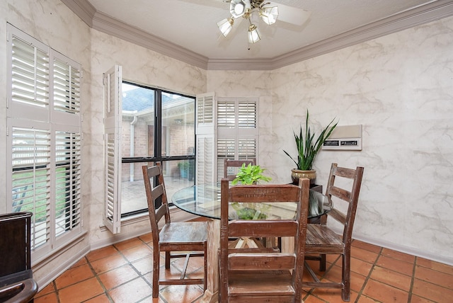 dining space featuring crown molding and ceiling fan