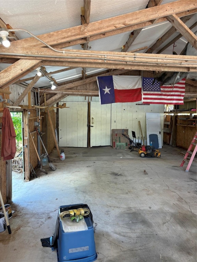 garage with wood walls