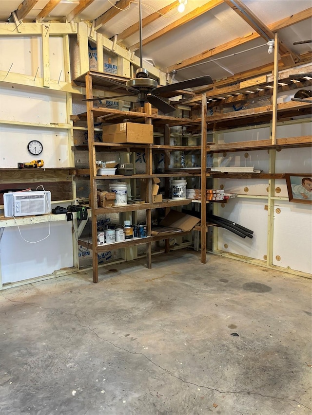 storage room featuring a wall mounted AC