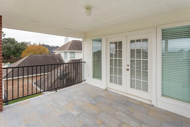 balcony featuring french doors