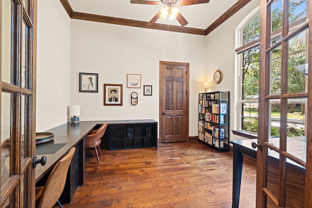 office with a wealth of natural light, french doors, ornamental molding, and hardwood / wood-style flooring