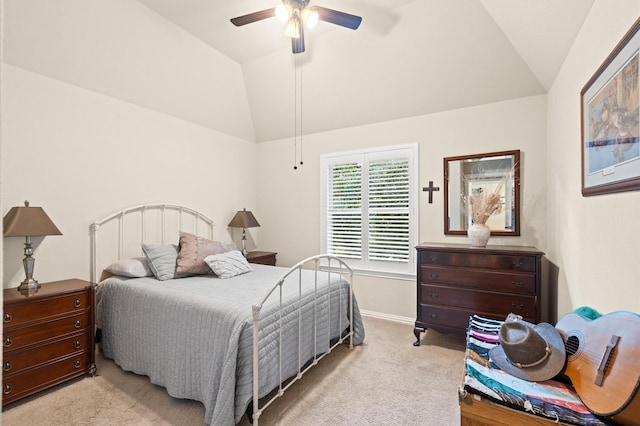 carpeted bedroom featuring ceiling fan and lofted ceiling