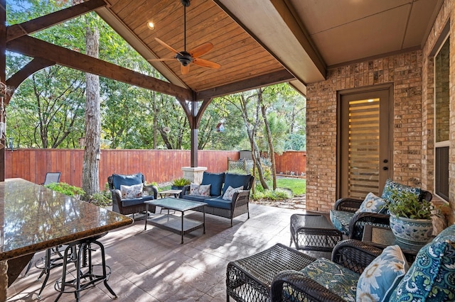 view of patio / terrace featuring an outdoor living space and ceiling fan