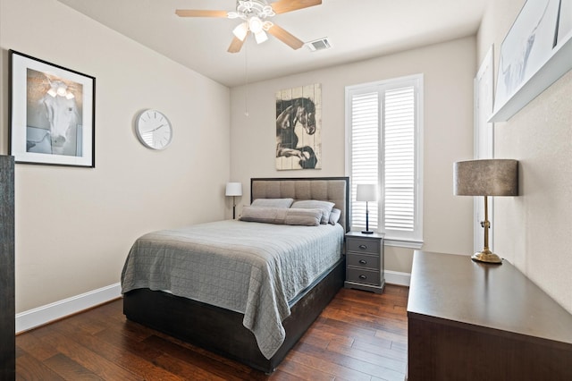 bedroom featuring ceiling fan and dark hardwood / wood-style floors