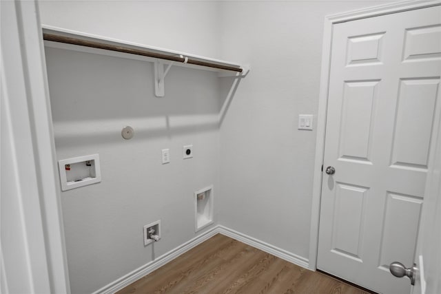 washroom featuring washer hookup, hardwood / wood-style flooring, gas dryer hookup, and electric dryer hookup