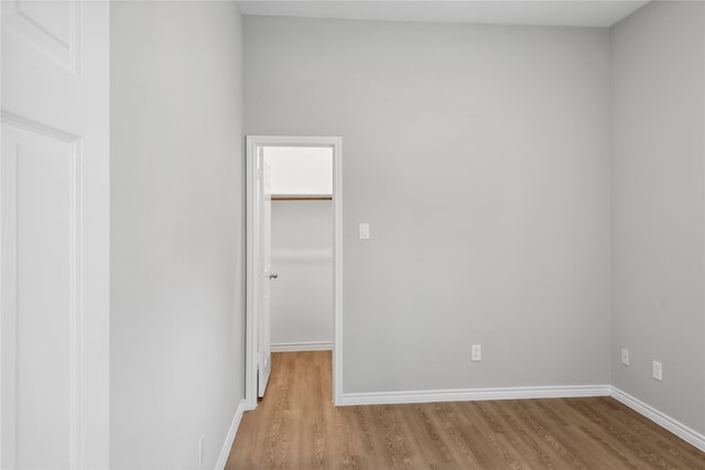 spare room with light wood-type flooring