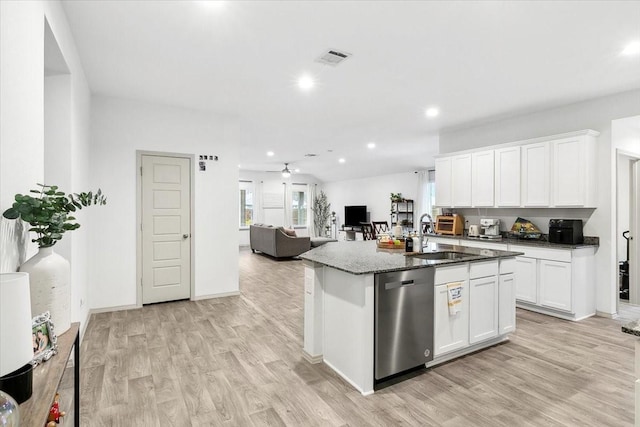 kitchen featuring dishwasher, white cabinetry, light wood-type flooring, and ceiling fan