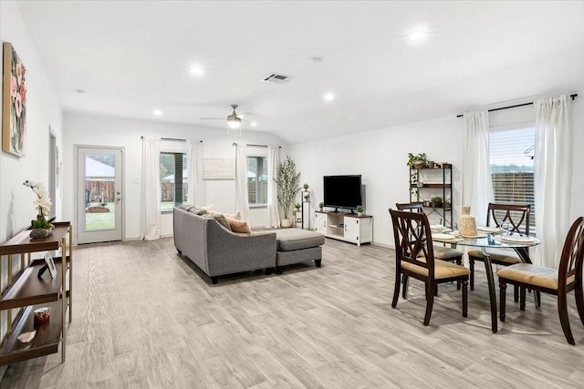 living room with plenty of natural light and light wood-type flooring