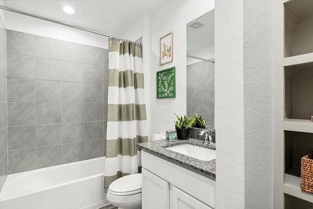 full bathroom featuring vanity, toilet, and shower / bath combo with shower curtain