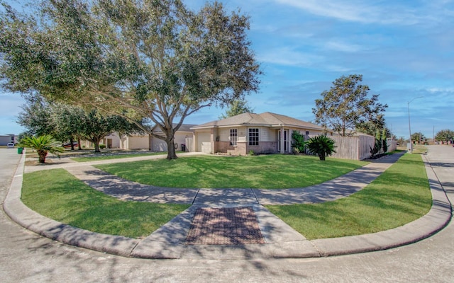 single story home featuring a front yard