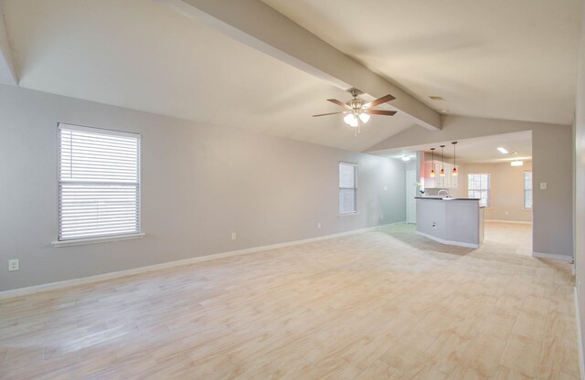 unfurnished living room featuring vaulted ceiling with beams, ceiling fan, and light wood-type flooring