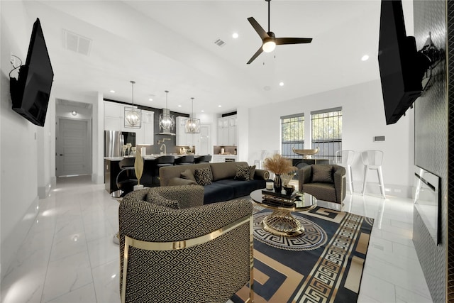 living room featuring ceiling fan