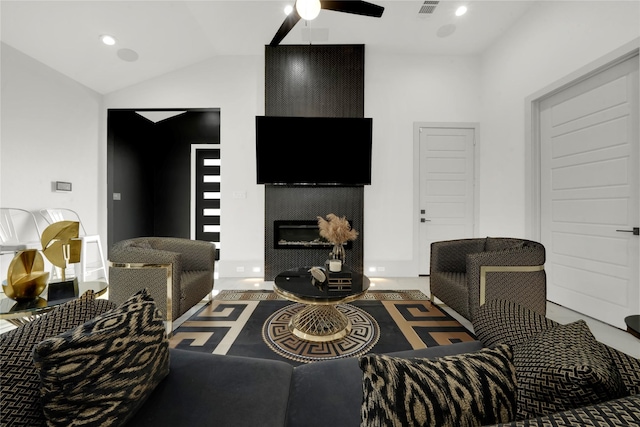 living room with ceiling fan and lofted ceiling