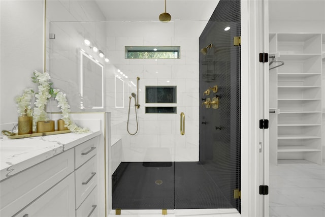 bathroom with vanity and an enclosed shower