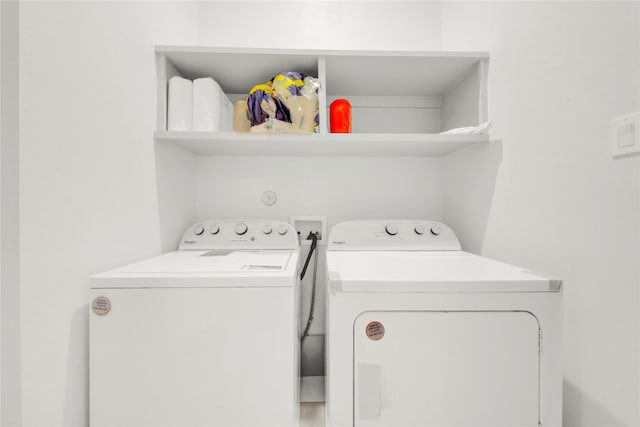 washroom featuring separate washer and dryer