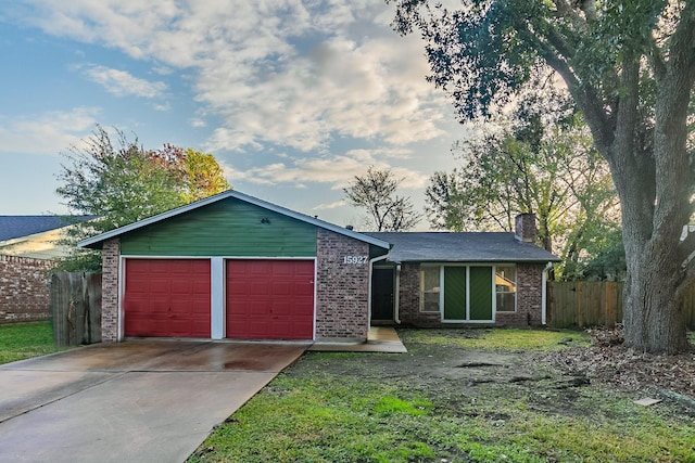 single story home featuring a garage