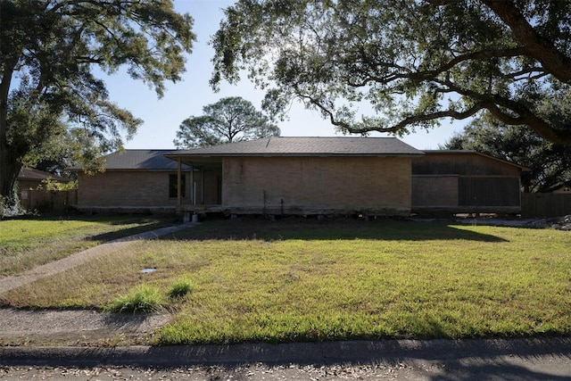 exterior space featuring a front lawn