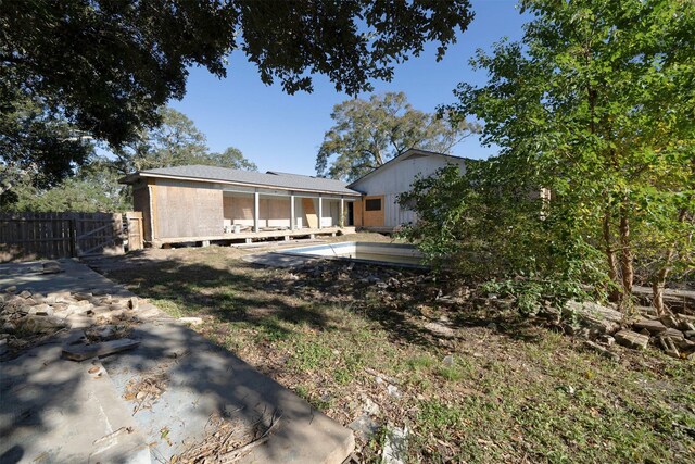 back of house featuring a patio area