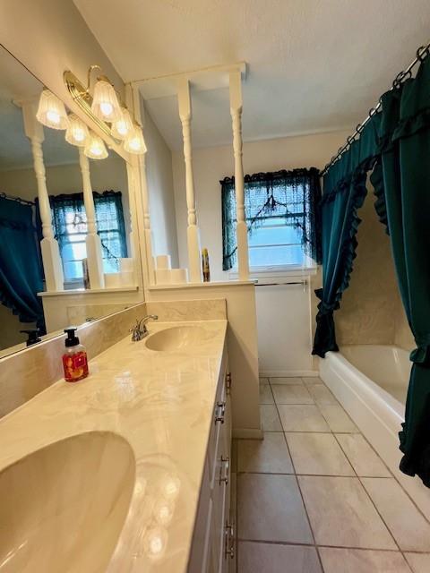 bathroom featuring tile patterned floors and vanity