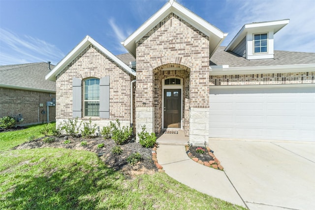 view of front of home featuring a garage