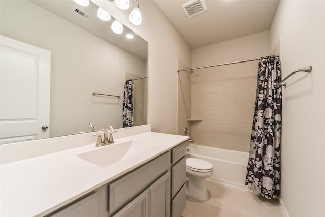 full bathroom with shower / tub combo, vanity, toilet, and tile patterned floors