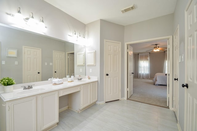 bathroom with vanity and ceiling fan