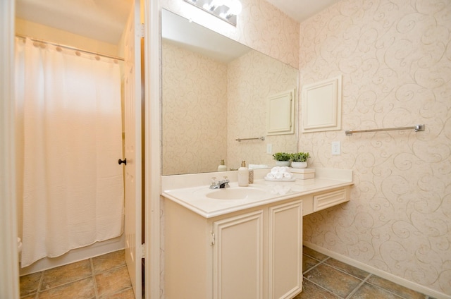 bathroom with vanity and walk in shower