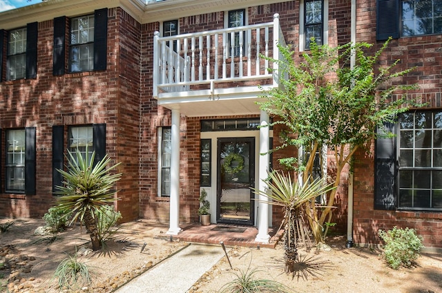 doorway to property with a balcony