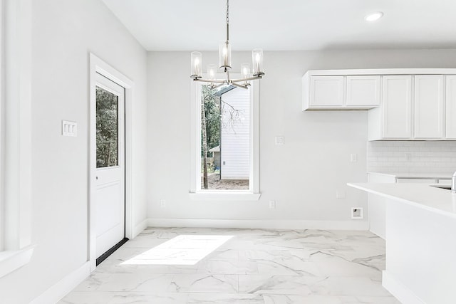 dining room with a chandelier