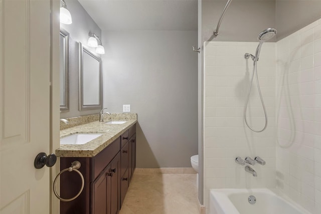 full bathroom with tile patterned floors, vanity, toilet, and tiled shower / bath