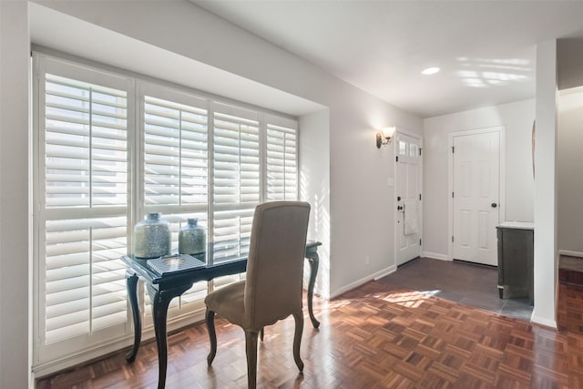 office area featuring dark parquet flooring