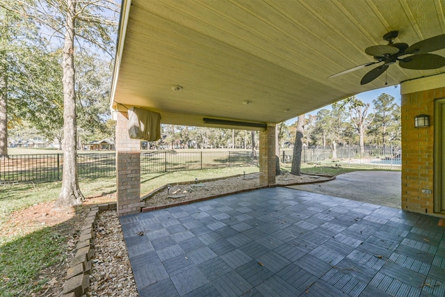 view of patio / terrace featuring ceiling fan