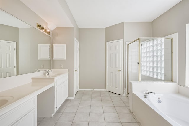 bathroom featuring tile patterned flooring, vanity, and independent shower and bath