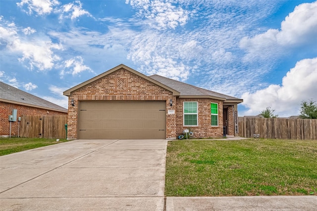 ranch-style home featuring a front lawn and a garage