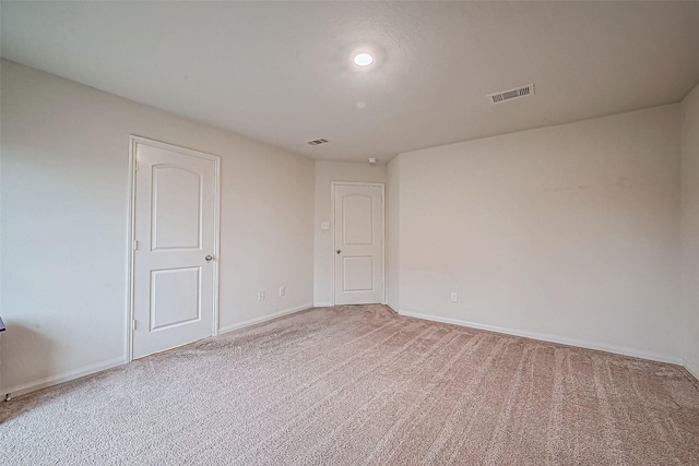 unfurnished room with carpet flooring