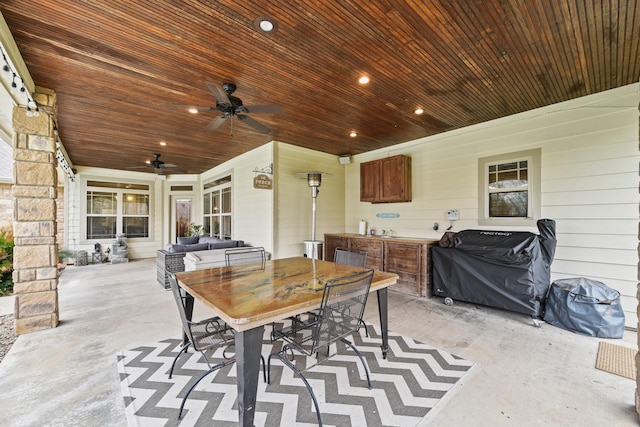 view of patio with grilling area and ceiling fan