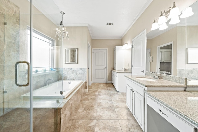 bathroom featuring ornamental molding, vanity, an inviting chandelier, tile patterned flooring, and shower with separate bathtub