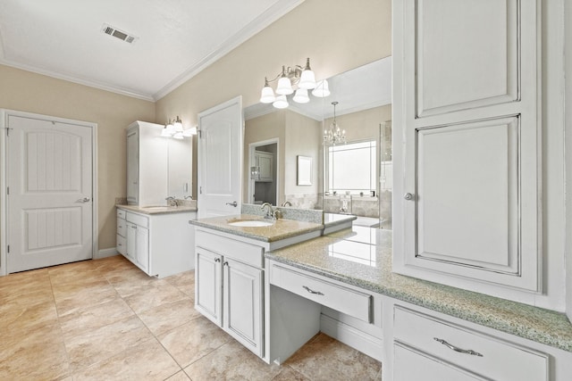 bathroom featuring tile patterned flooring, vanity, ornamental molding, and an inviting chandelier