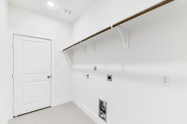 clothes washing area featuring electric dryer hookup, gas dryer hookup, and hookup for a washing machine