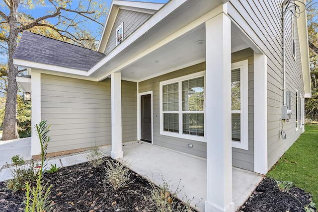 doorway to property with covered porch