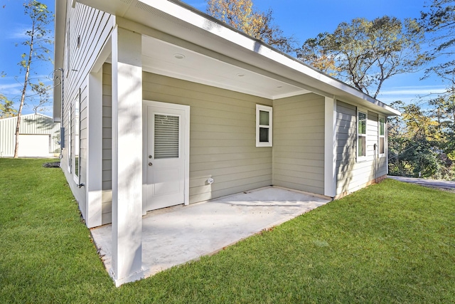 rear view of property with a yard