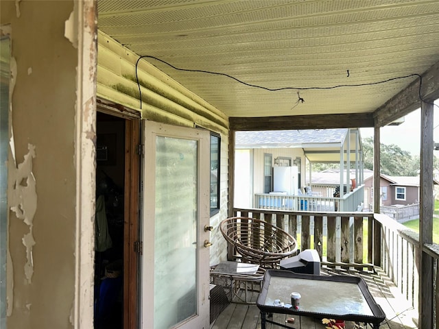 wooden deck with a porch