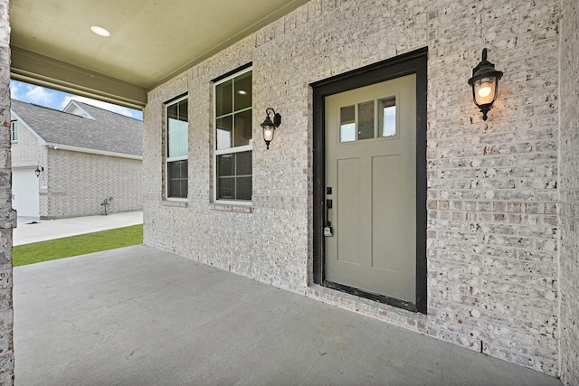 114 Little Spring Ct, Anahuac, TX 77514 - doorway to property with a porch