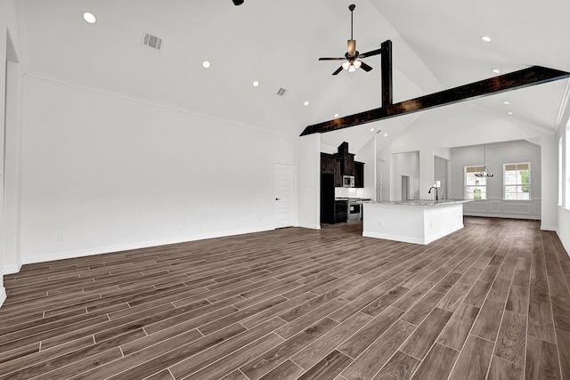 114 Little Spring Ct, Anahuac, TX 77514 - unfurnished living room featuring ceiling fan, dark wood-style floors, a sink, recessed lighting, and high vaulted ceiling