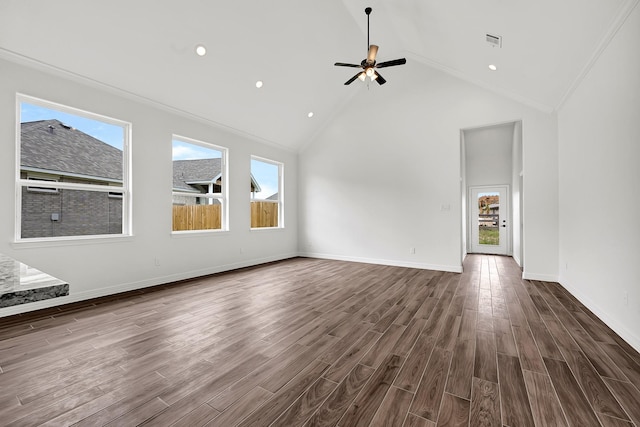 114 Little Spring Ct, Anahuac, TX 77514 - unfurnished living room featuring dark wood finished floors, healthy amount of natural light, high vaulted ceiling, a ceiling fan, and baseboards